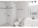 Clean bathroom with white subway tile shower, toilet, and vanity at 2504 S Cannon Blvd, Kannapolis, NC 28083