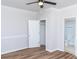 Bedroom with ceiling fan, closet, and door to en suite bathroom at 2504 S Cannon Blvd, Kannapolis, NC 28083