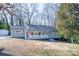 Charming single-story home featuring a welcoming front porch and a well-maintained lawn at 2504 S Cannon Blvd, Kannapolis, NC 28083