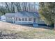 Charming ranch home with covered front porch and mature trees at 2504 S Cannon Blvd, Kannapolis, NC 28083