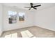 Bedroom with two windows and a ceiling fan at 3025 Swallowtail Ln, Kannapolis, NC 28083