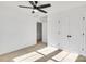 Bright bedroom with ceiling fan and double doors at 3025 Swallowtail Ln, Kannapolis, NC 28083