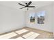 Bedroom with two windows and ceiling fan at 3025 Swallowtail Ln, Kannapolis, NC 28083