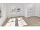 Bright dining room with hardwood floors and large windows at 3025 Swallowtail Ln, Kannapolis, NC 28083