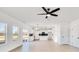 Open concept living room and kitchen with hardwood floors and lots of light at 3025 Swallowtail Ln, Kannapolis, NC 28083