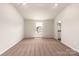 Bright bedroom with carpeted floor and large window at 3266 Maple Ridge Dr, Gastonia, NC 28052
