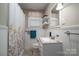 Clean bathroom with shower/tub combo and updated vanity at 408 Elizabeth St, Gastonia, NC 28054