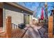 Wooden deck with grill and access to backyard at 408 Elizabeth St, Gastonia, NC 28054