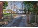 Long driveway leads to the house and carport at 408 Elizabeth St, Gastonia, NC 28054