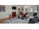 Living room with sectional sofa and fireplace at 408 Elizabeth St, Gastonia, NC 28054