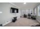 Bright home office space with large windows, comfortable chair, and workspace at 408 Elizabeth St, Gastonia, NC 28054