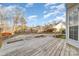 Backyard with wooden deck and patio area at 5110 Osage Cir, Charlotte, NC 28269