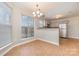 Dining area with tile floor and kitchen views at 5110 Osage Cir, Charlotte, NC 28269
