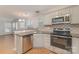 Kitchen with stainless steel appliances and granite counters at 5110 Osage Cir, Charlotte, NC 28269