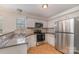 Kitchen with stainless steel appliances and granite counters at 5110 Osage Cir, Charlotte, NC 28269