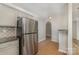 Kitchen with stainless steel refrigerator and granite counters at 5110 Osage Cir, Charlotte, NC 28269