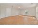 Living room with tile floor and neutral walls at 5110 Osage Cir, Charlotte, NC 28269
