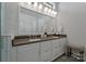 Elegant bathroom with double vanity, large mirror, and walk-in shower at 82112 Standing Oak Dr, Charlotte, NC 28278