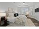 Comfortable main bedroom with a plush bed and window seating at 82112 Standing Oak Dr, Charlotte, NC 28278