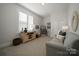 Cozy bedroom with a sofa and jukebox at 82112 Standing Oak Dr, Charlotte, NC 28278