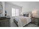 Serene bedroom with a queen-size bed and nightstands at 82112 Standing Oak Dr, Charlotte, NC 28278