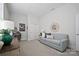 Charming bedroom with a comfortable sofa and a stylish mirror at 82112 Standing Oak Dr, Charlotte, NC 28278