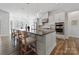 Modern kitchen features a large island, stainless steel appliances, and ample counter space at 82112 Standing Oak Dr, Charlotte, NC 28278