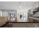 Modern kitchen with large island and stainless steel appliances at 82112 Standing Oak Dr, Charlotte, NC 28278