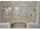 Bathroom features a large walk-in shower with a built-in seat at 92 Heritage Dr, Clover, SC 29710