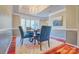 Elegant dining room with hardwood floors, bay window, and chandelier at 92 Heritage Dr, Clover, SC 29710