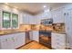 Well-equipped kitchen with granite countertops and modern appliances at 92 Heritage Dr, Clover, SC 29710