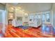 Spacious living room with hardwood floors, fireplace, and large windows at 92 Heritage Dr, Clover, SC 29710