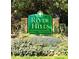 River Hills entrance sign showing lush landscaping, marking entry to a vibrant, well-maintained lakeside community at 92 Heritage Dr, Clover, SC 29710