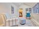 Bright sunroom with ample seating and access to the outdoors at 92 Heritage Dr, Clover, SC 29710