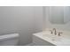 Small bathroom with a white sink and toilet at 9451 Bonnie Briar Cir, Charlotte, NC 28277