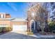 Brick front exterior of charming townhome with attached garage and inviting front steps at 9451 Bonnie Briar Cir, Charlotte, NC 28277