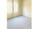 Bright bedroom with neutral walls and carpet at 115 Venus Ave, Gastonia, NC 28052
