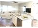 Open concept kitchen with island and stainless steel appliances at 115 Venus Ave, Gastonia, NC 28052