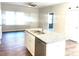 Open concept kitchen with island and stainless steel appliances at 115 Venus Ave, Gastonia, NC 28052