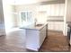 Modern kitchen with island and granite countertops at 115 Venus Ave, Gastonia, NC 28052
