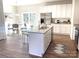 Modern kitchen with island, stainless steel appliances, and granite countertops at 115 Venus Ave, Gastonia, NC 28052