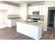 Modern kitchen with island and granite countertops at 115 Venus Ave, Gastonia, NC 28052