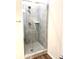 Modern shower with gray tile and glass enclosure at 115 Venus Ave, Gastonia, NC 28052