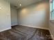 Simple bedroom with carpet, neutral walls, and a window at 1225 E 34Th St # Csw0419, Charlotte, NC 28205