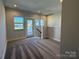 Bright bonus room with carpet, windows, and access to private deck at 1225 E 34Th St # Csw0419, Charlotte, NC 28205