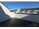 Private deck with composite decking overlooking neighboring houses at 1225 E 34Th St # Csw0419, Charlotte, NC 28205