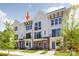 Charming townhome exterior with brick accents, modern design, and inviting curb appeal at 1225 E 34Th St # Csw0419, Charlotte, NC 28205