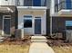 Townhome entry with modern design and landscaping at 1225 E 34Th St # Csw0419, Charlotte, NC 28205