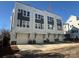 Three-story townhome building with attached garages and modern design at 1225 E 34Th St # Csw0419, Charlotte, NC 28205
