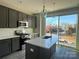 Modern kitchen featuring stainless steel appliances and an island at 1225 E 34Th St # Csw0419, Charlotte, NC 28205